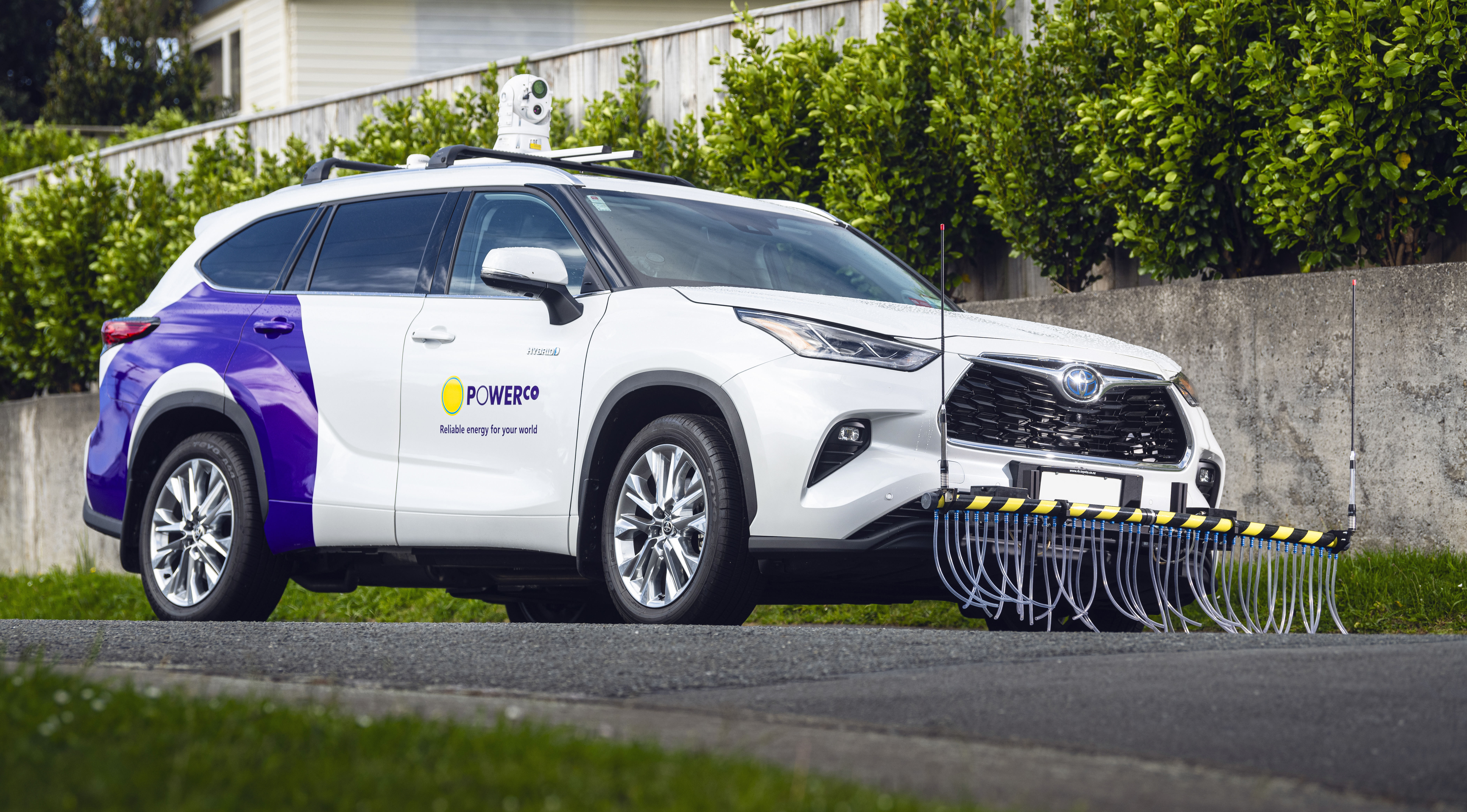 A Powerco branded vehicle with gas detection with 40 intake pipes on the front bumper and a lazer sensor on the roof