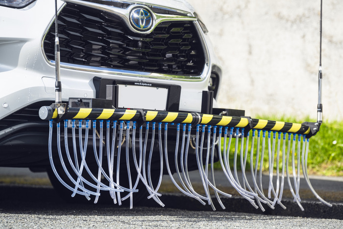 Plastic pipes mounted on a bumper of a car