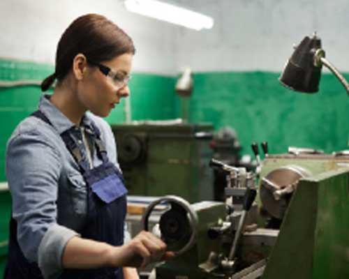 woman operating engineering equipment