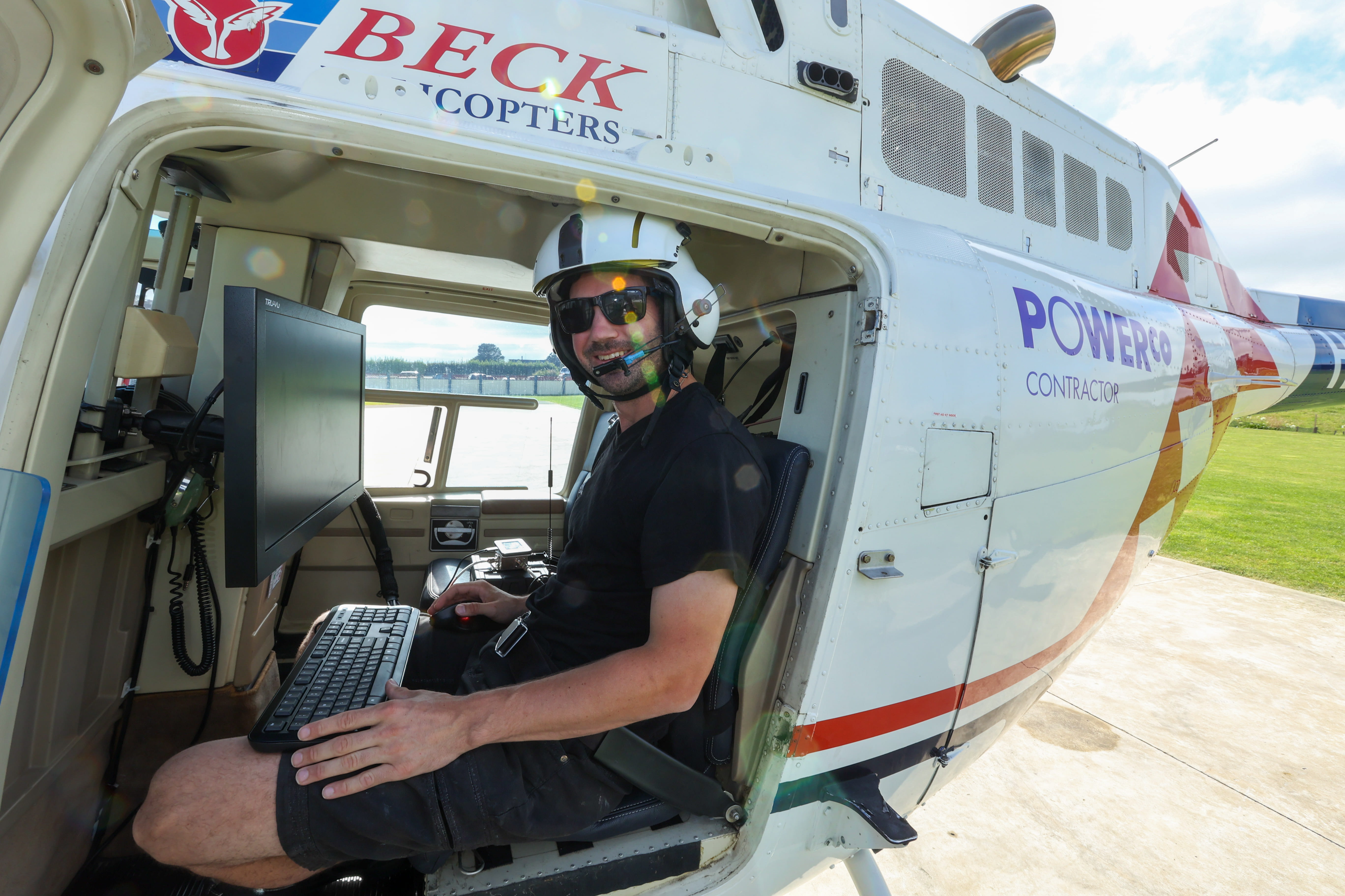 LiDAR technician in helicopter